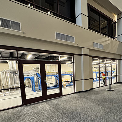 the atrium of a typical administration building with glass windows