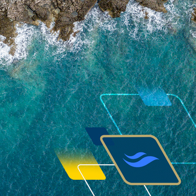 Overhead view of waves crashing on rocks