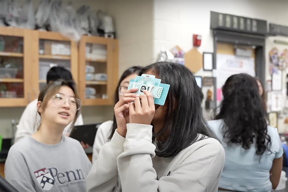 students learning with Georgia Tech's frugal science
