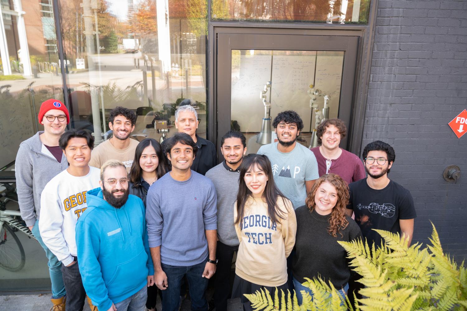 The Georgia Tech Center for Music Technology research team behind FOREST (L to R) (Back row): Richard Savery, Michael Verma, Gil Weinberg, Raghav Sankaranarayanan, and Amit Rogel. (Middle row): Jumbo Jiahe, Rose Sun, Nikhil Krishnan, and Sean Levine. (Front row): Mohammad Jafari, Nitin Hugar, Qinying Lei, and Jocelyn Kavanagh. (Photo credit: Allison Carter, Georgia Tech)