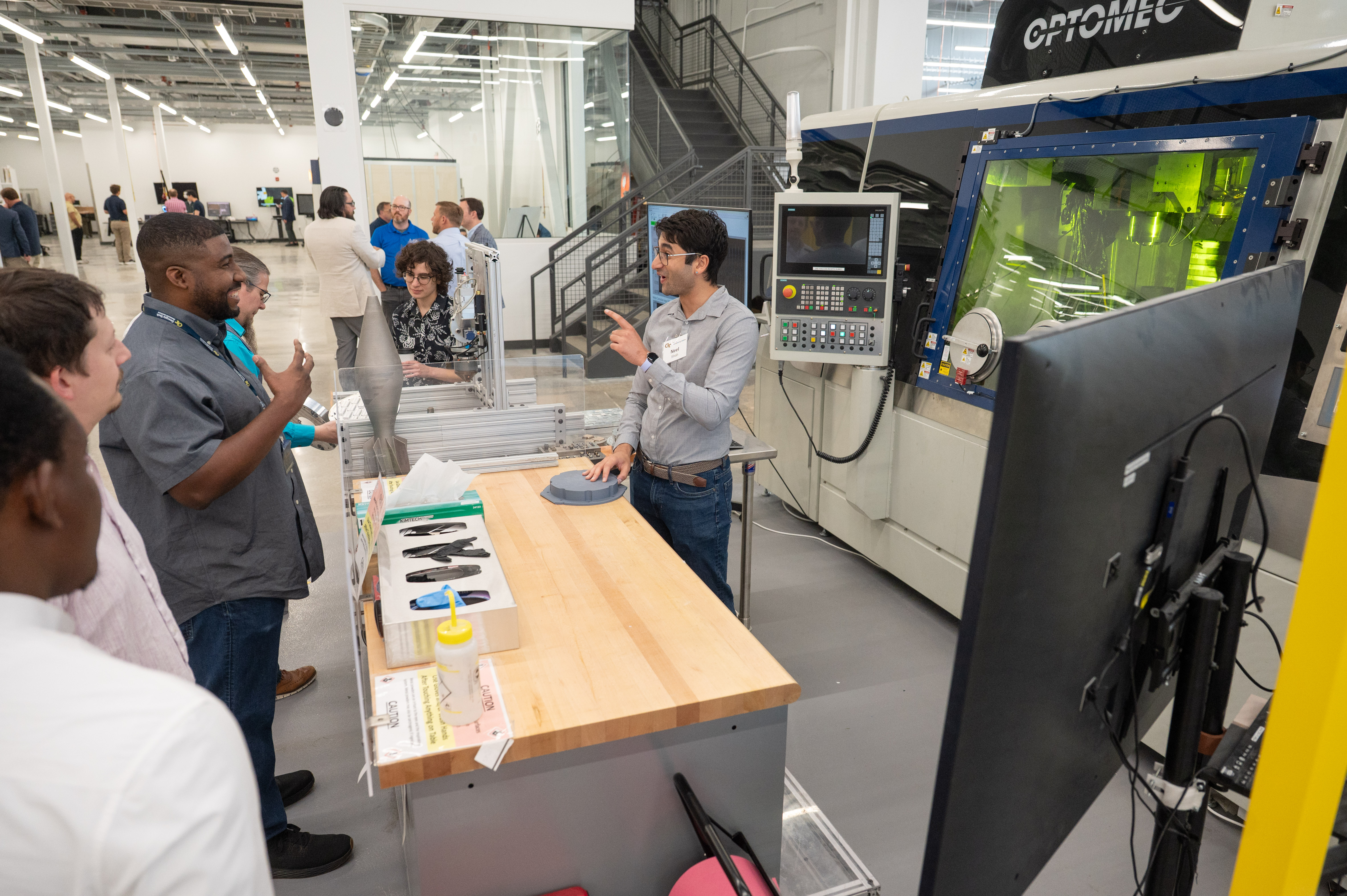 Georgia Tech doctoral candidates Neel Shah and Jamila Khanfri in discussion