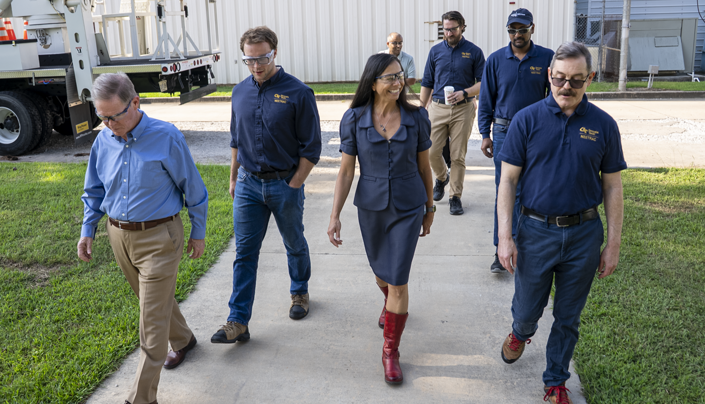 Department of Energy Office of Electricity Assistant Secretary Catherine Jereza (center) tours NEETRAC's research and testing facilities at GeorgiaTech. The visit highlighted the center's work with utilities, manufacturers, and government partners to address emerging challenges facingthe nation's electric grid.
