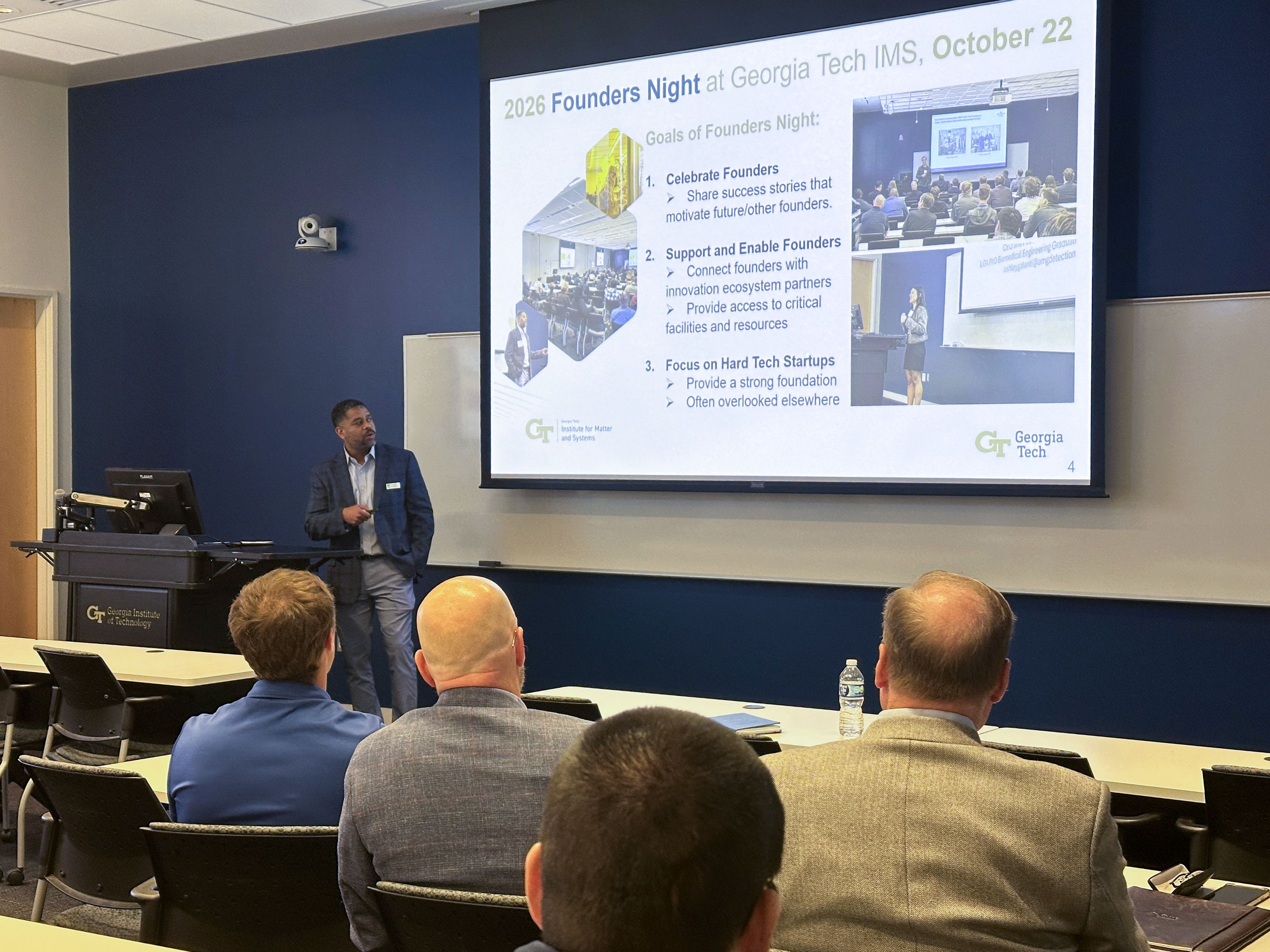Billyde Brown addresses attendees beneath a slide outlining goals for 2026 Founders Night at Georgia Tech IMS, including celebrating, supporting, and enabling founders.