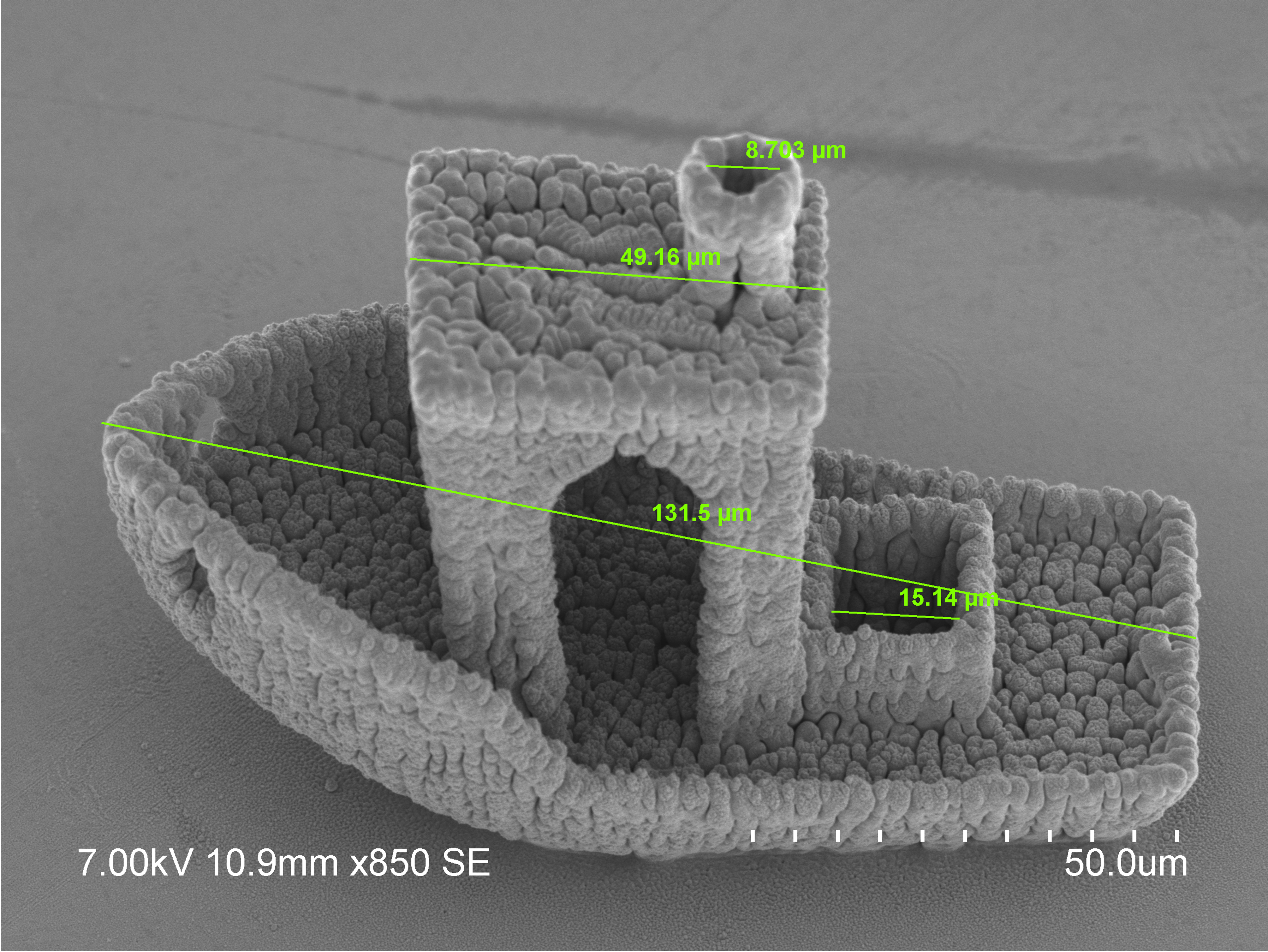 Microscope software interface displays a microfabricated structure alongside measurement, calibration, and image-analysis tools used during characterization. Detailed description required in adjacent page content.