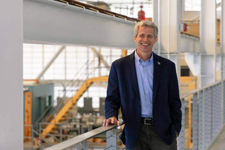 Tim Lieuwen standing above one of the Strategic Energy Institute's (SEI) research areas. 