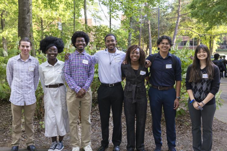 From left to right, Jack Rose, Team Carchive; Angela Duodu, Hadley Williams,  Brandon Parker, Oluwatooni Alade , and Jesus Sierra Jr., Team Sensible; and  Yasmine Green, Team Onyc.