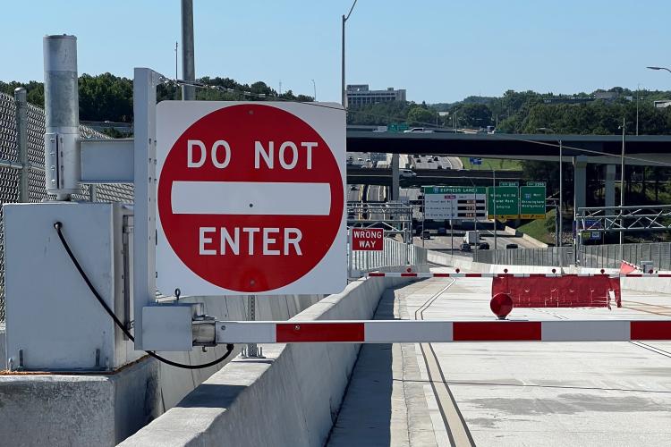 Gate blocking reversible lane
