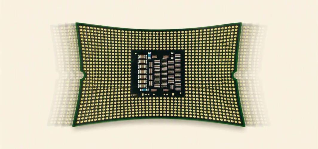 Flexible electronic device with a dense array of interconnects bends under mechanical strain, demonstrating stretchable semiconductor packaging and advanced flexible electronics technology.