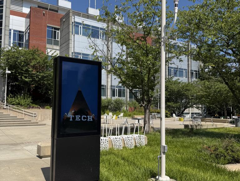 An digital display outside the Love Building 