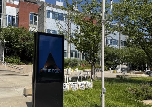 An digital display outside the Love Building 