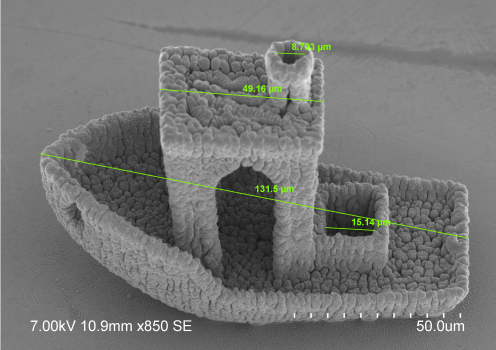 Microscope software interface displays a microfabricated structure alongside measurement, calibration, and image-analysis tools used during characterization. Detailed description required in adjacent page content.
