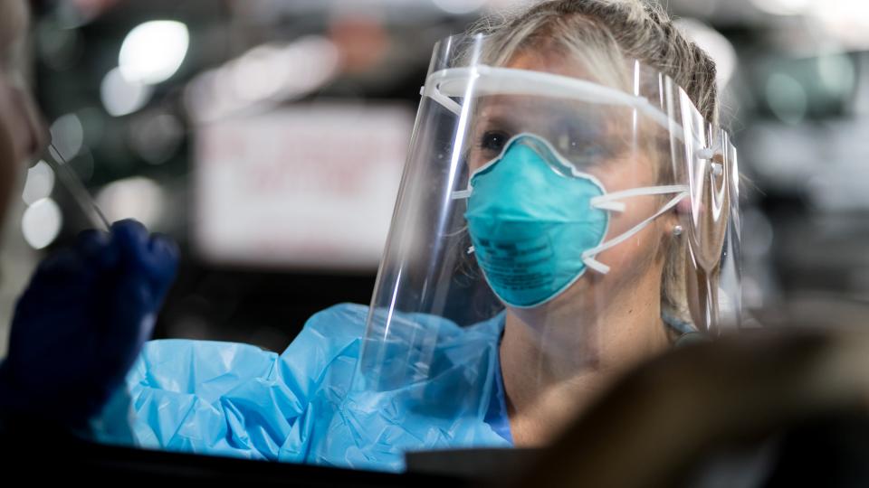 Nurse wearing face shield