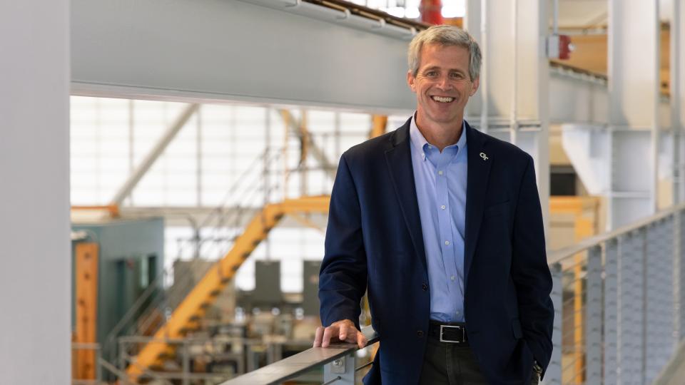 Tim Lieuwen standing above one of the Strategic Energy Institute's (SEI) research areas. 