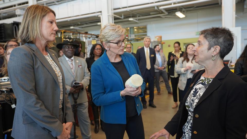 U.S. Secretary of Energy Jennifer Granholm (center) is brought up to date by Georgia Tech's Krista Walton (left) and Jennifer Hirsch (right) during a 2024 visit to campus.
