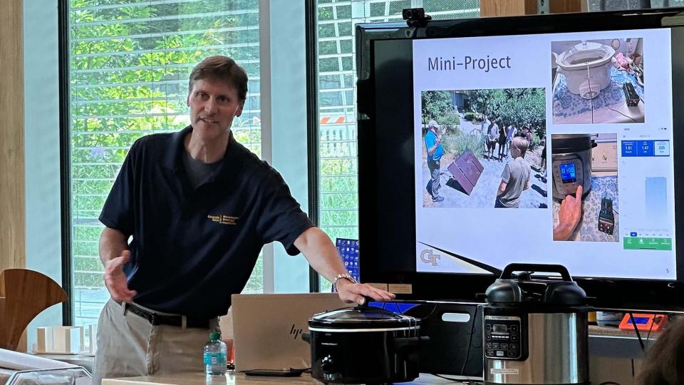 Rich Simmons explaining the mini-project before the final student presentations 