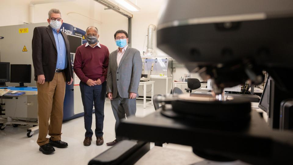 photograph of Oliver Brand, Madhavan Swaminathan, Shimeng Yu in lab