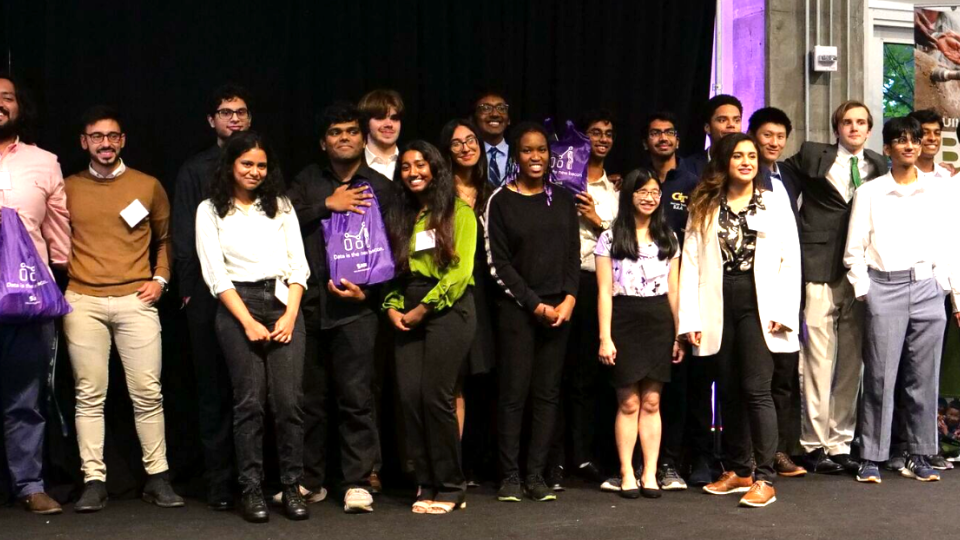 Winners of the EGHI/GT Hackathon stand together at Tech Square ATL Social