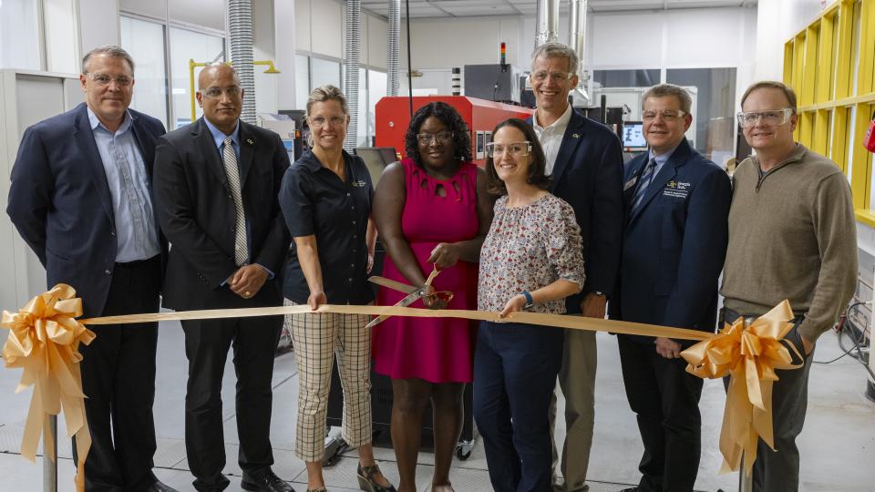 Partners of the facility gathered for an official ribbon cutting ceremony. 