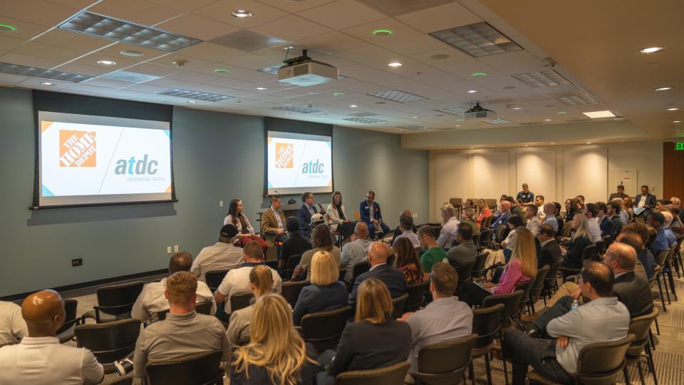 Panelists and audience photo