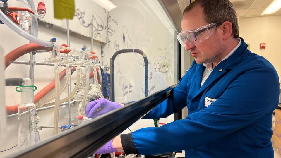 Will Gutekunst working in his lab