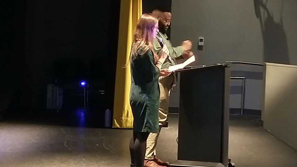 Nicole Kennard introduces Georgia Tech Alum Andrew White on the stage at the Atlantic Theater.