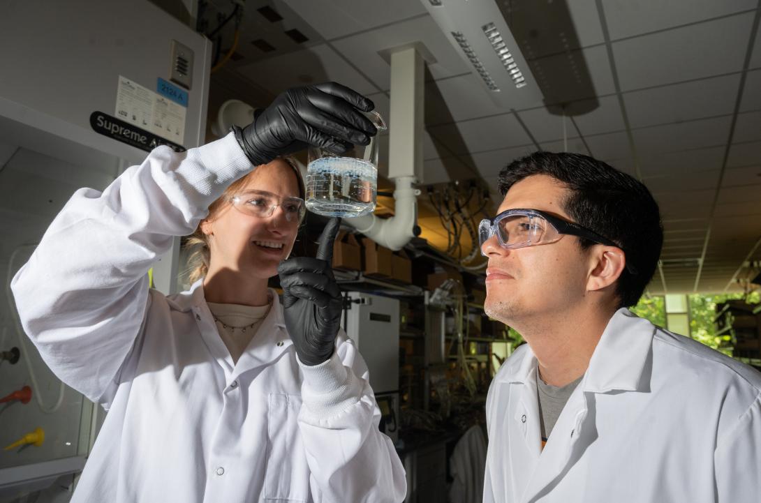 Erik Barbosa and Madeline Morrell examine salt beads.JPG