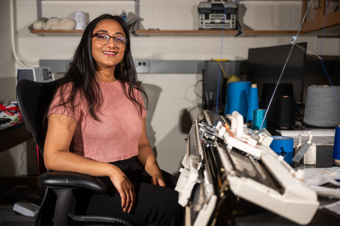 Krishma Singal with knitting machine 