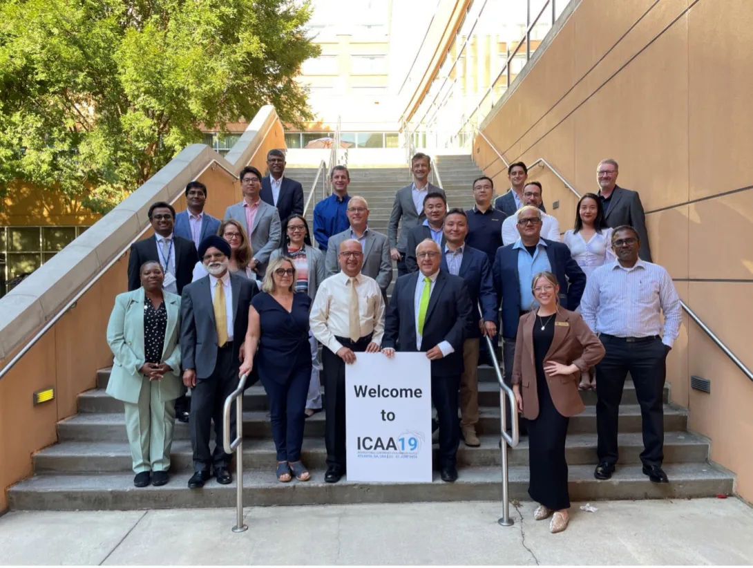 A group photo of several researchers at ICAA19.