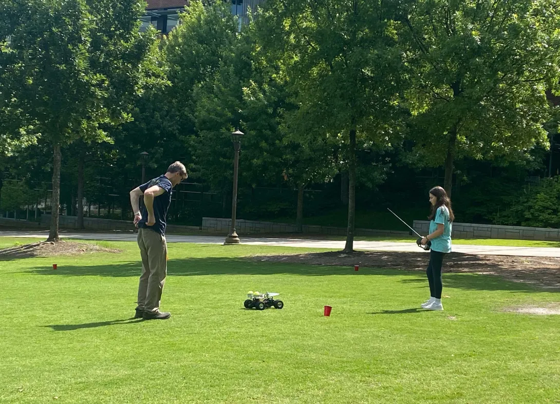 Energy Unplugged camper testing a remote car at Georgia Tech Green 