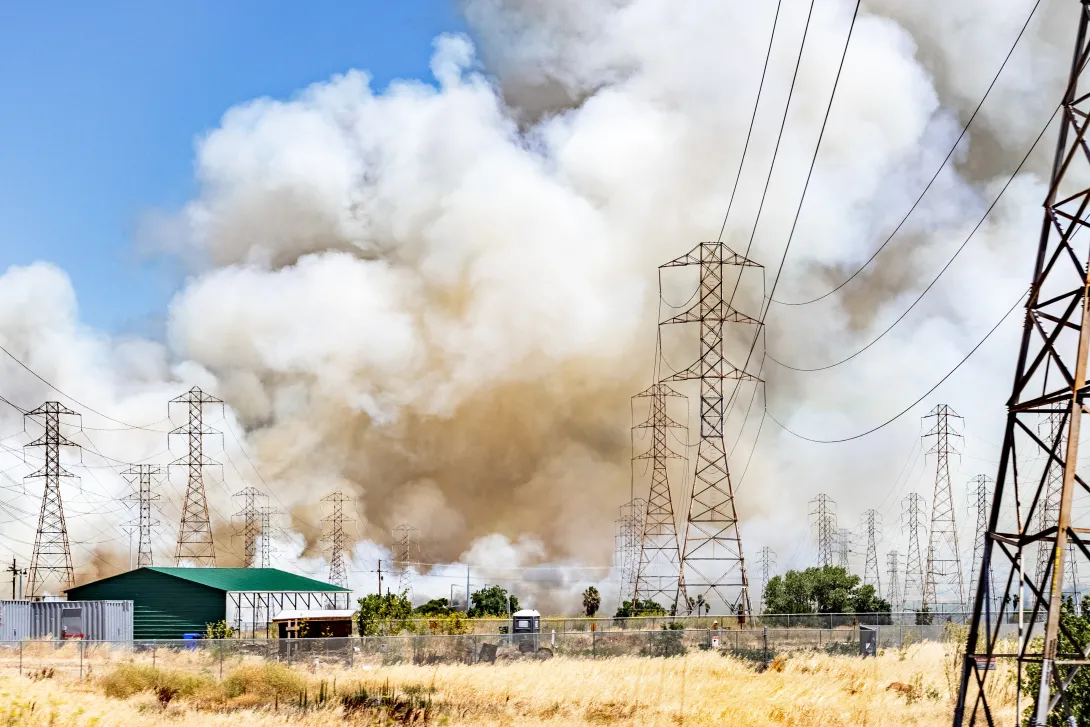 Smoke cloud rising from a brush wildfire burning in San Francisco, California