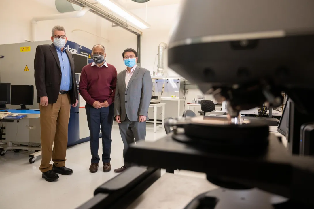 photograph of Oliver Brand, Madhavan Swaminathan, Shimeng Yu in lab