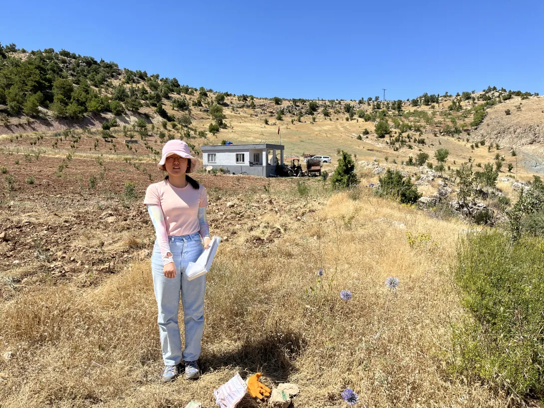 Georgia Tech graduate student Chang Ding pointing at a deployed seismic node in Southern Turkey