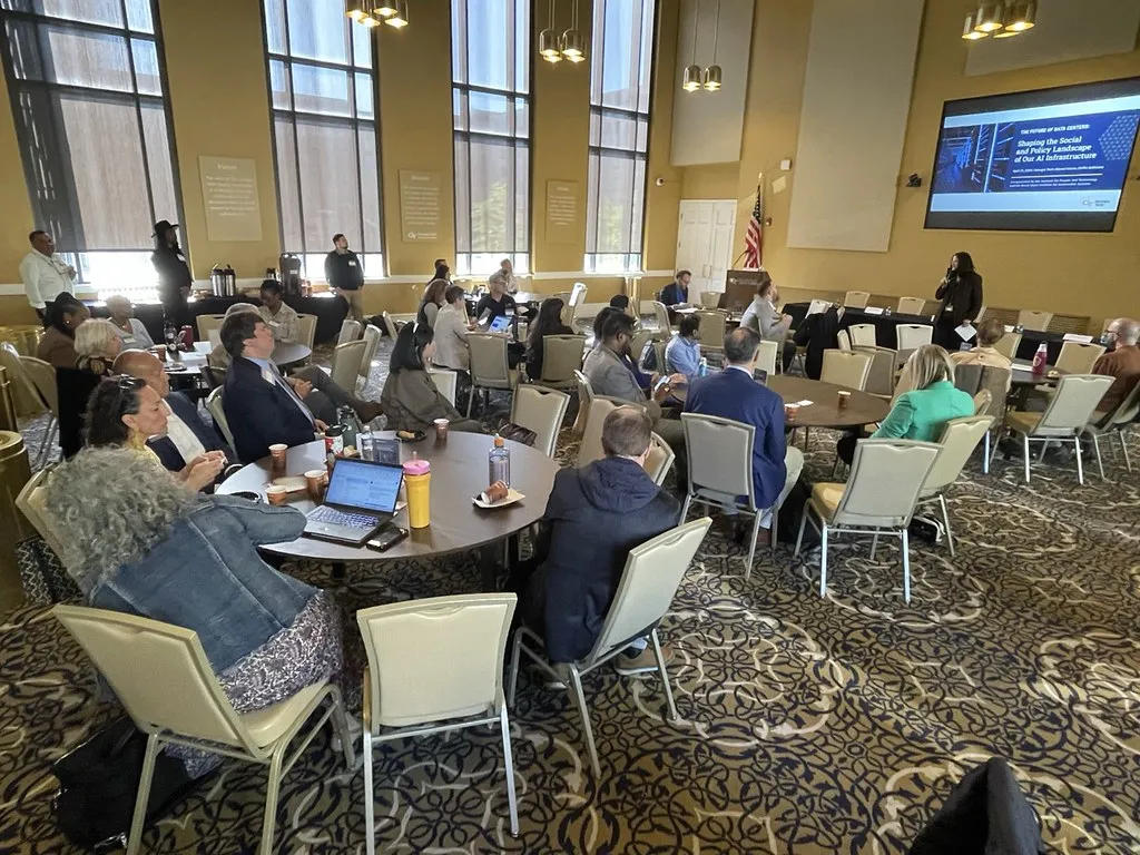 Beril Toktay delivering the welcome and introductory remarks to the attendees. 