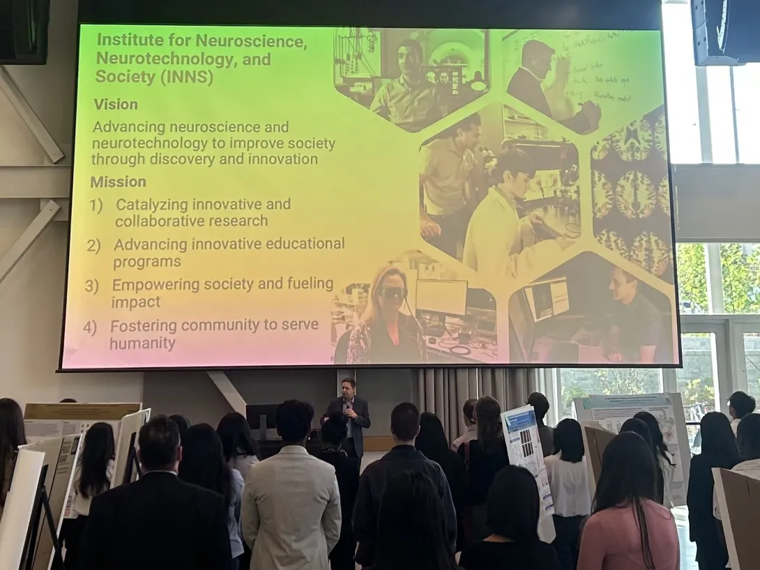 Chris Rozell is giving the opening remarks at the ATL Neuro Networking and Symposium Night.