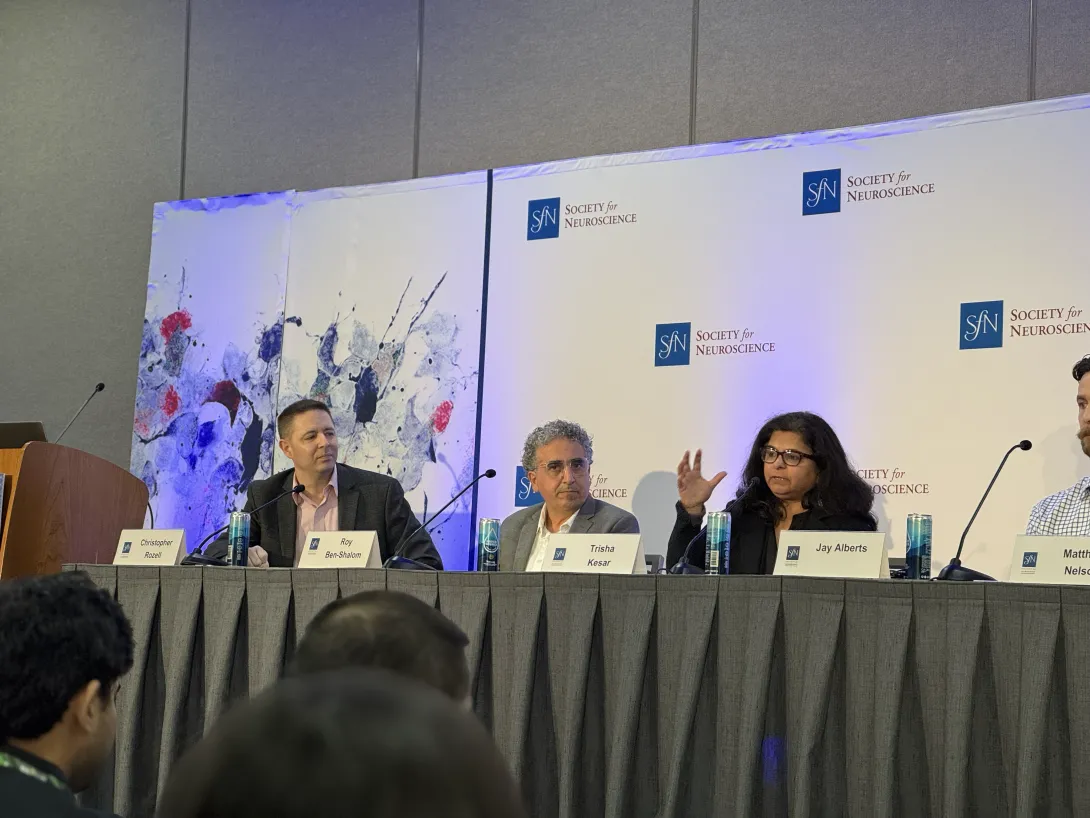 Trisha Kesar answers a question during the SfN press conference on AI in neuroscience, moderated by Chris Rozell.
