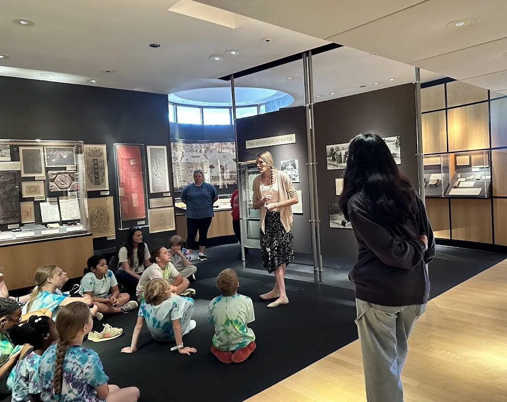 Doll giving a tour of the Robert C. Williams Museum of Papermaking to K-12 Students