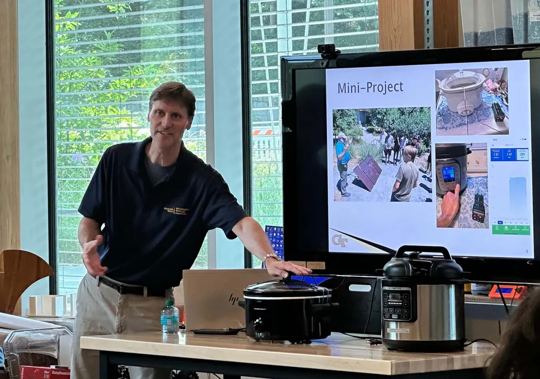 Rich Simmons explaining the mini-project before the final student presentations 