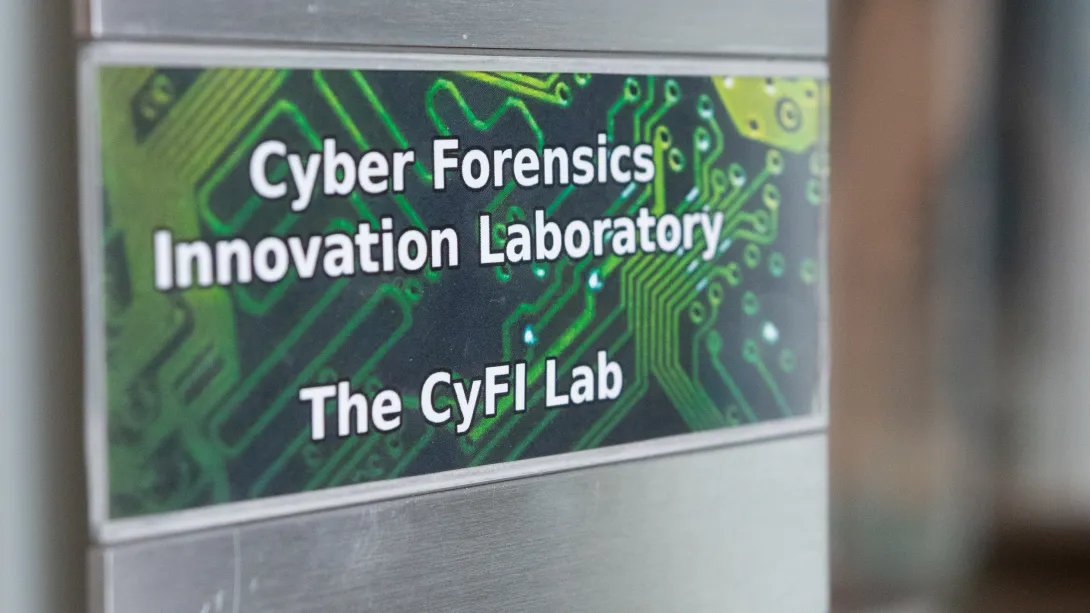 Sign reading Cyber Forensics Innovation Laboratory The CyFI Lab