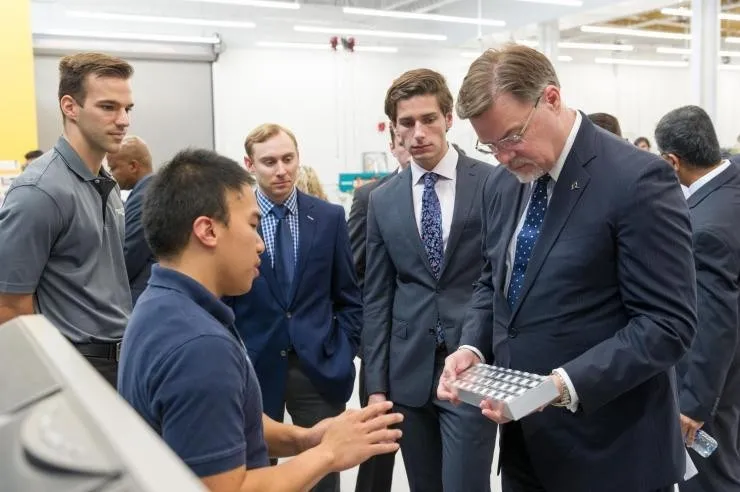Toni Cvitanic (left) at Georgia Tech with Boeing executives