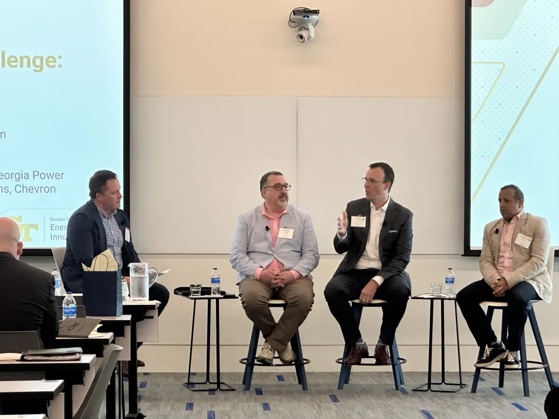 Panel Moderator Marc Miller (ScottMadden) with Panelists Steve Chriss (Walmart), Aaron Mitchell (Georgia Power), and Srimonto Ghosh (Chevron)
