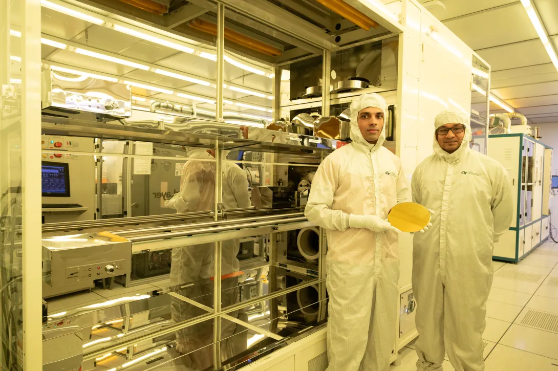 Researchers in clean room