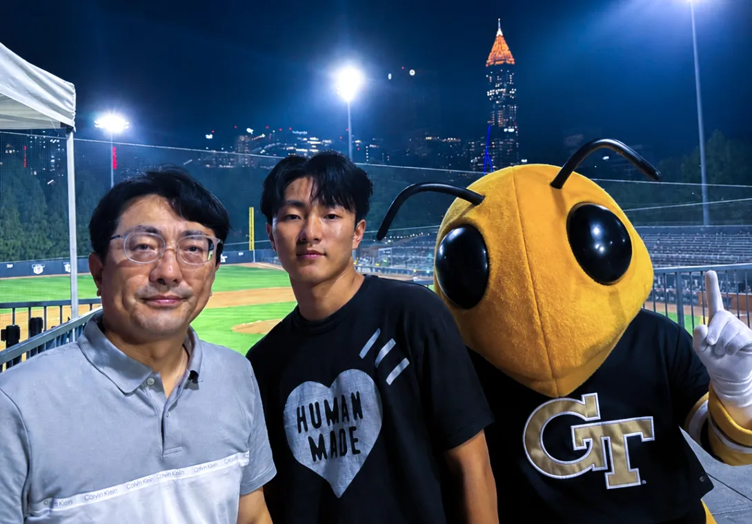 Sanghyun Jang with son Ricky and Buzz.
