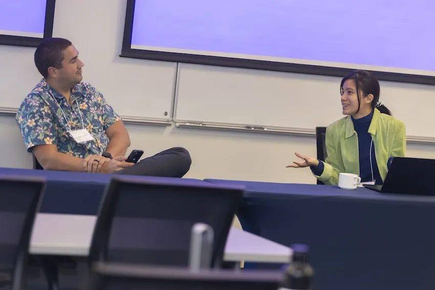 School of IC's Josiah Hester (left) and Cindy Lin discuss AI's future impact on sustainability. 