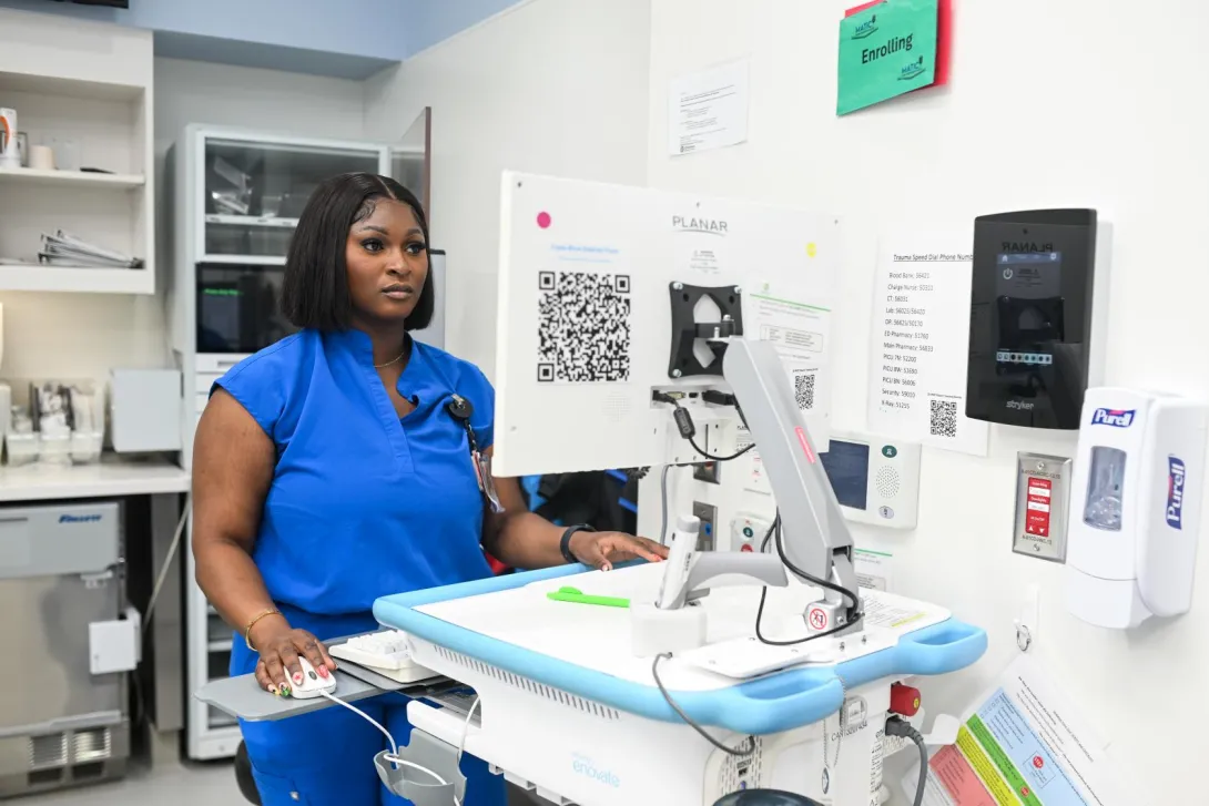 Pediatric healthcare professional reviewing electronic health record information at Children’s Healthcare of Atlanta Arthur M. Blank Hospital.