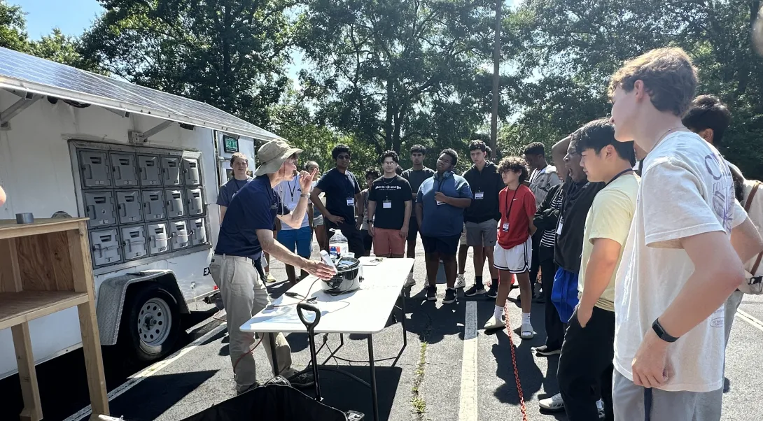 Rich Simmons, teaches energy production and consumption using Footprint Project's Solar Trailor 
