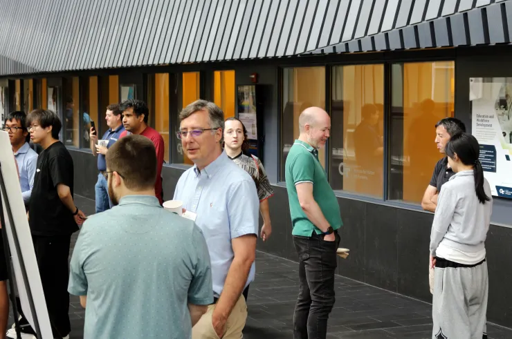 People attending a scientific poster session
