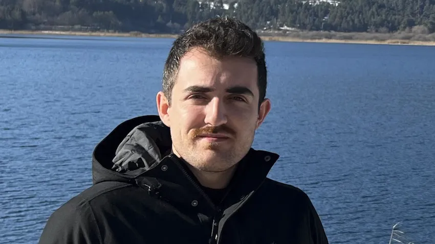 An outdoor photo portrait of Georgia Tech CS Ph.D. student Ilhan Fatih