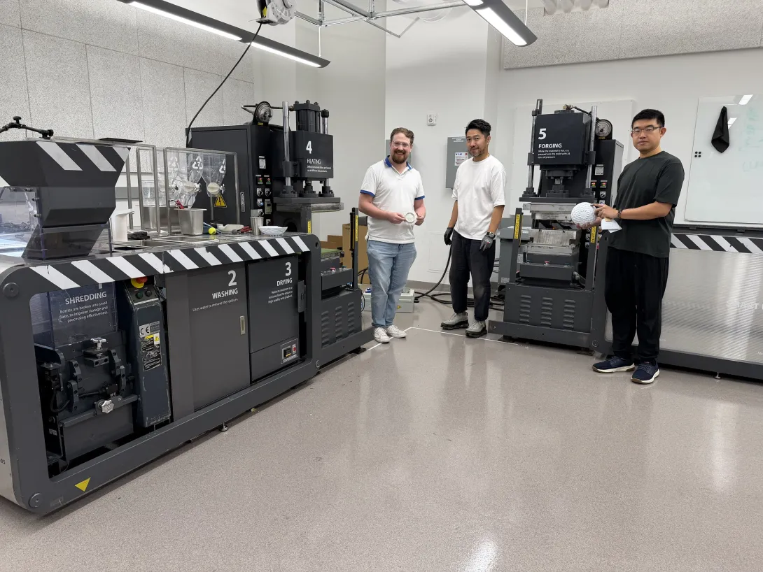 Pictured left to right: Tim Trent, IPaT’s lab director for the Trash Lab; Arthur Huang, CEO of Miniwiz; and Tai Liu, mechanical engineer with Miniwiz. In this picture, they are installing the miniTrashpresso system in the TSRB building.
