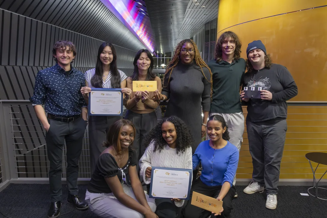 Pictured, the winners of the Fall 2025 I2P Showcase stand in Marcus Nano Tech atrium with their certificates