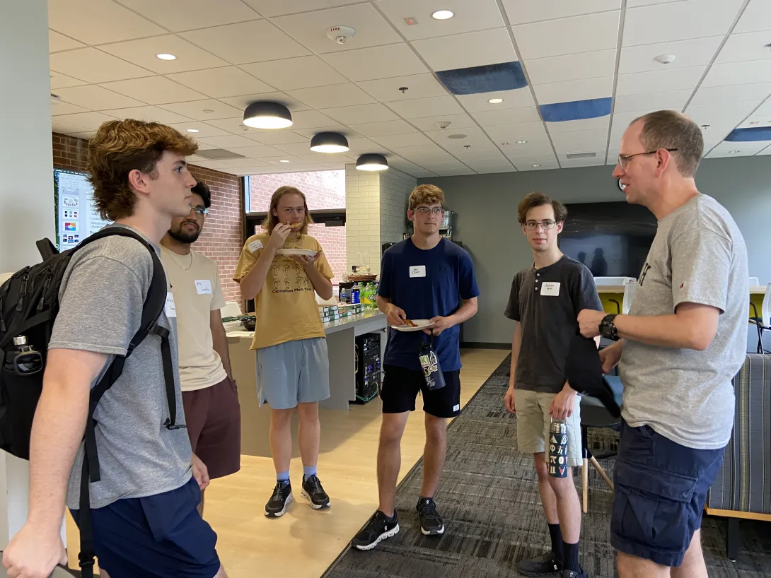 School of Physics Professor Sven Simon greeted some of the new astrophysics majors. 